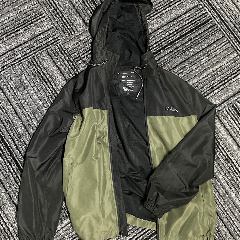 Available: Green and black Matix windbreaker